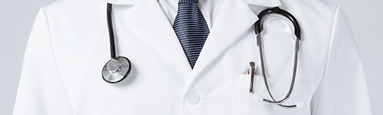 bright close up of male doctor with stethoscope